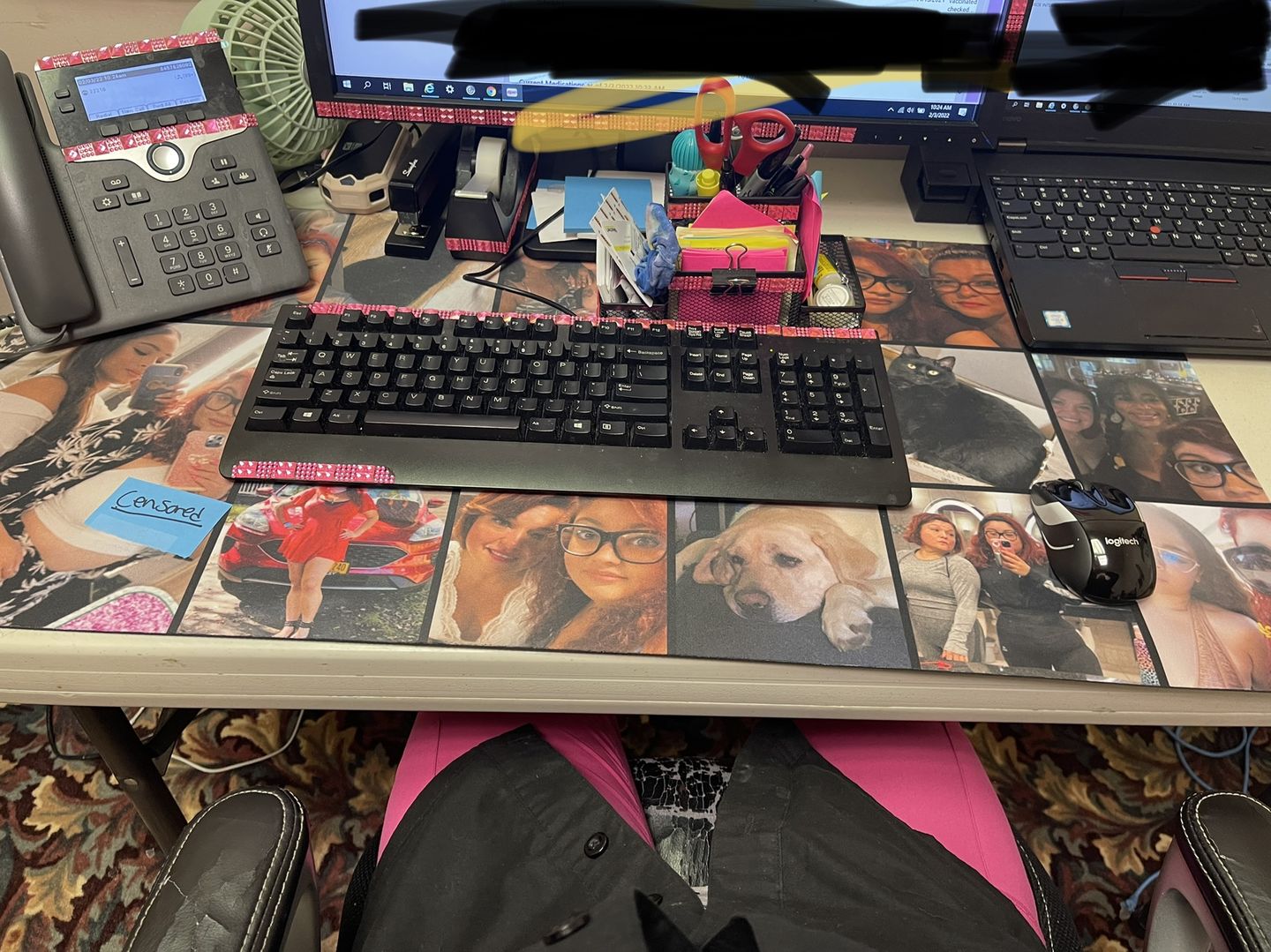 Custom desk mat printed as a photo collage of family and pet pictures on an office desk