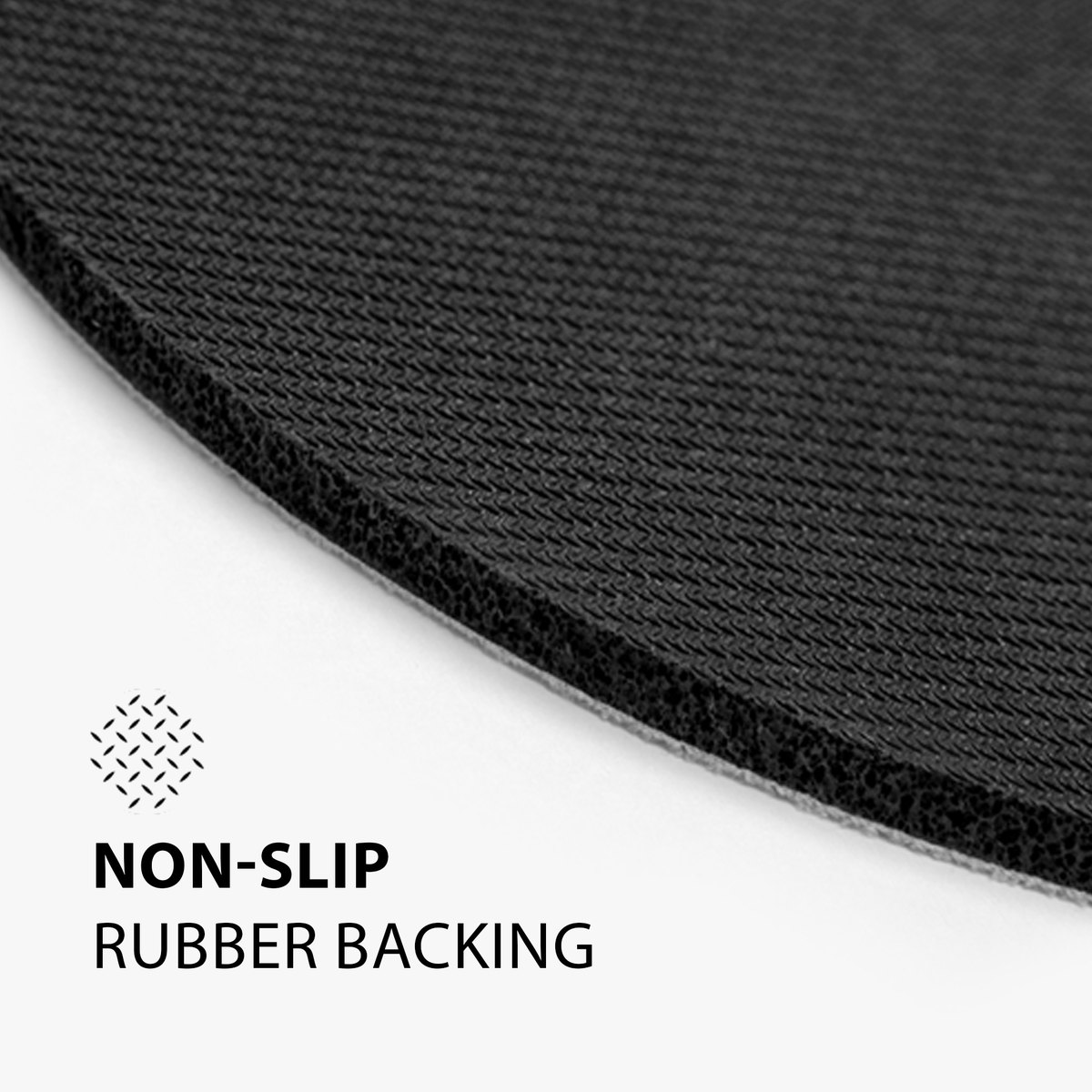 Close-up of the textured non-slip rubber base of a custom mouse pad