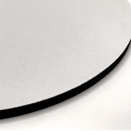 Corner of a desk mat with a seamless heat-sealed edge and no border