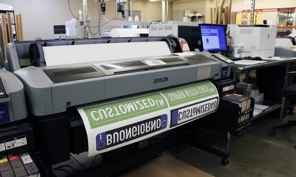 Custom license plate designs printing on a wide-format Epson sublimation printer