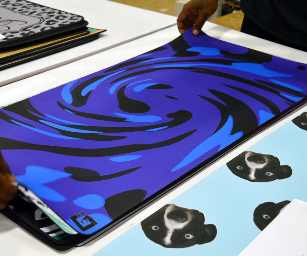 Stack of Real Custom Desk Mats